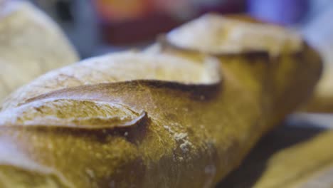 freshly baked baguette in france close up camera movement on a slider