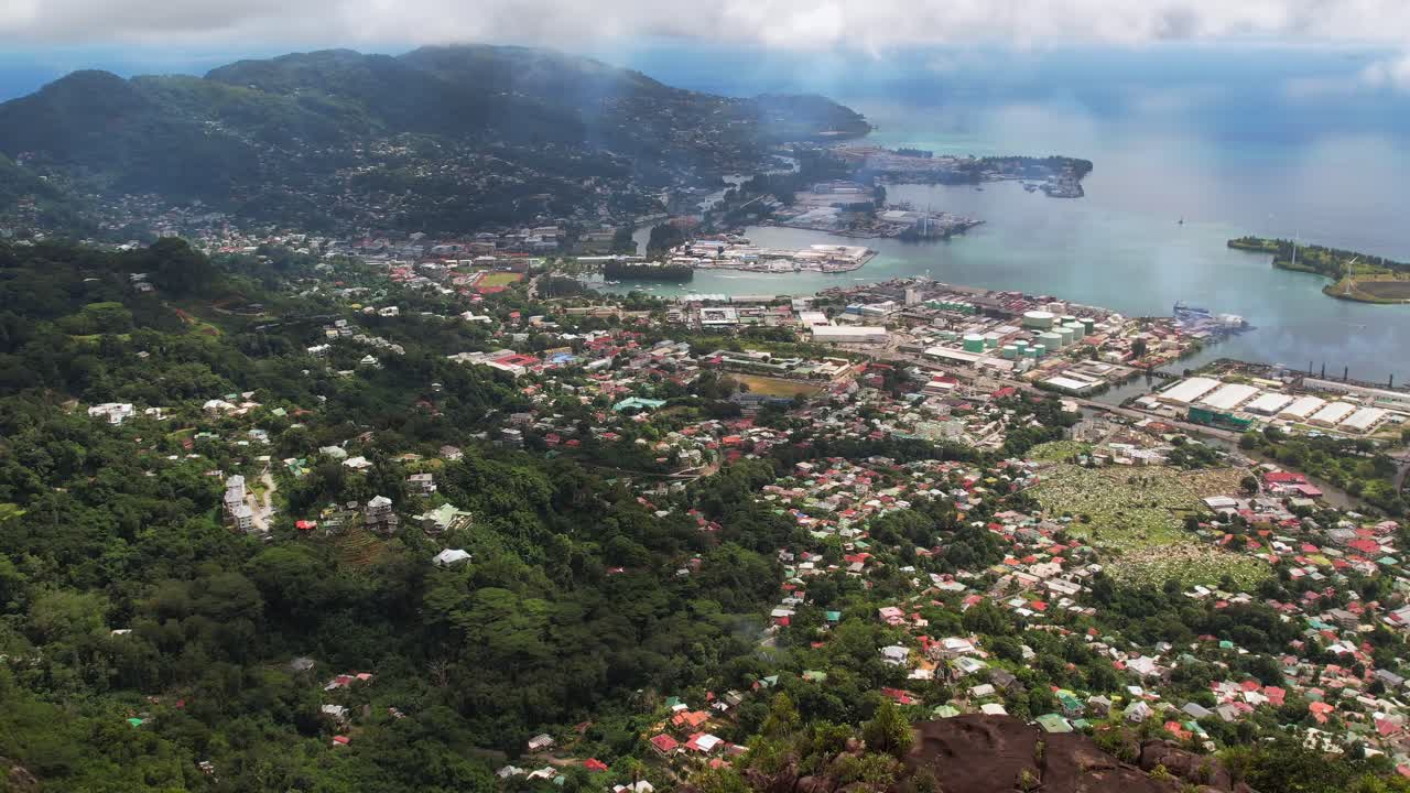 Drone shot from copolia trail of town victoria and the Seychelles international port, Mahe Seychelles