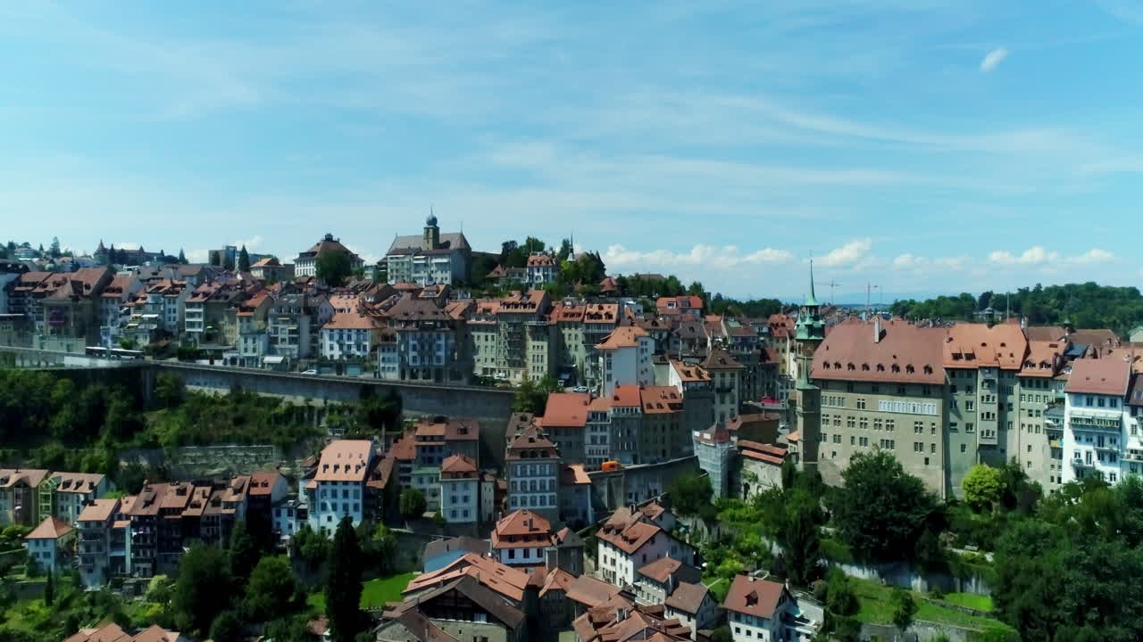 Drone aerial rising over fribourg switzerland village - city summer 1