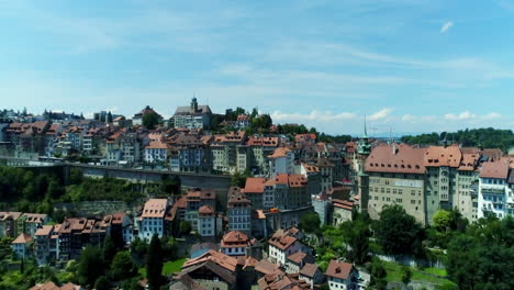 drone aerial rising over fribourg switzerland village - city summer 1