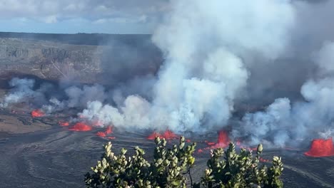 cinematic long lens shot of lava fountains erupting from kilauea volcano on the first day of activity in september 2023 at hawai'i volcanoes national park