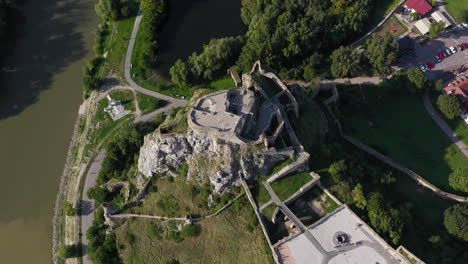 downward angle rotating drone footage of the hrad devin castle in bratislava, slovakia