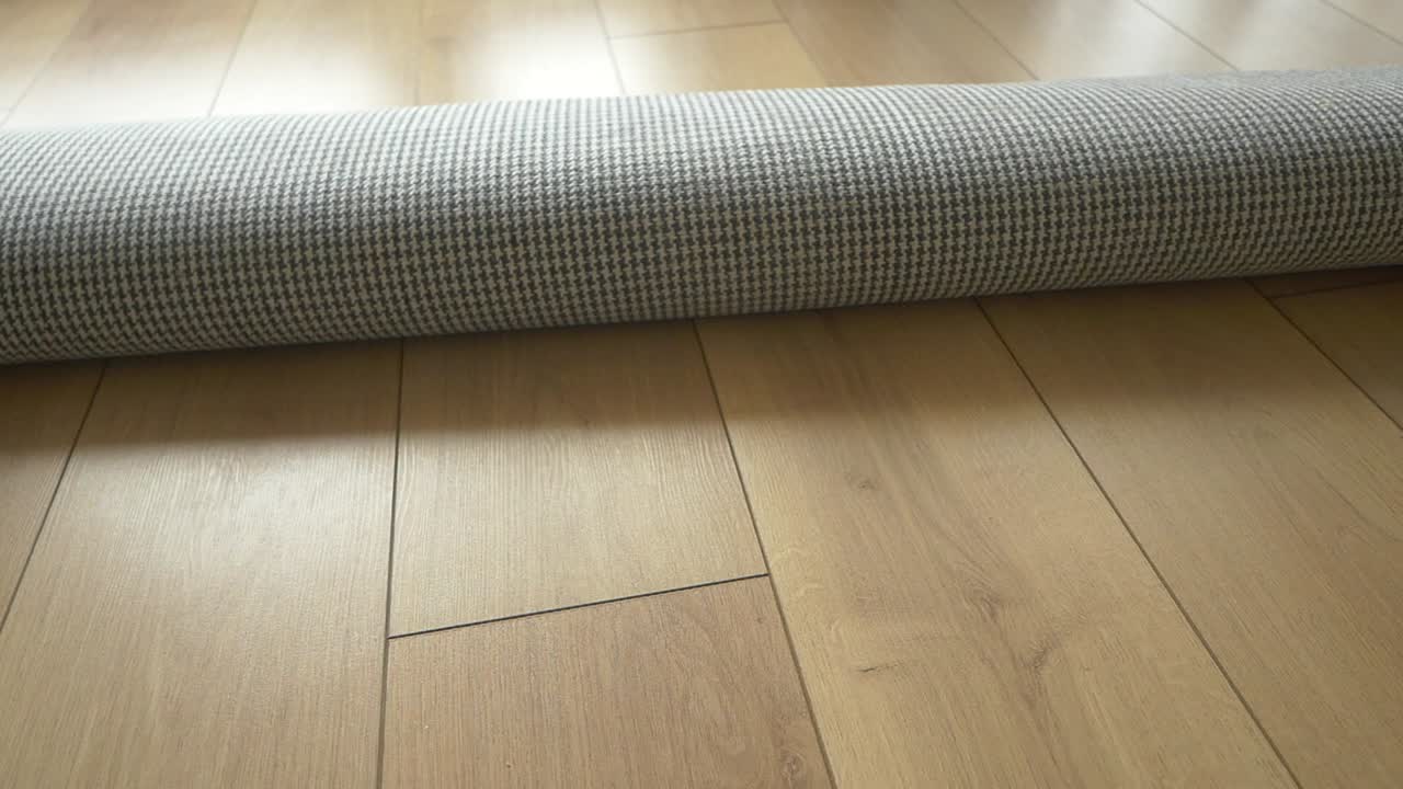 Rolled Carpet on Wood Flooring