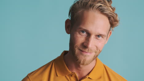 attractive man smiling and looking at front