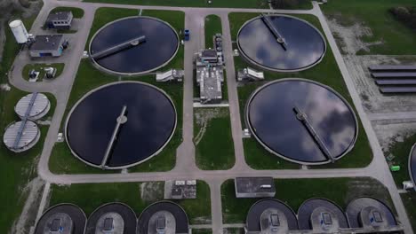 aerial view of water filtration plant in zwijndrecht, south holland, netherlands - drone static shot