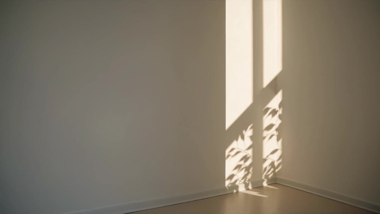 Abstract Shadows of Leaves Moving on a Plain Wall