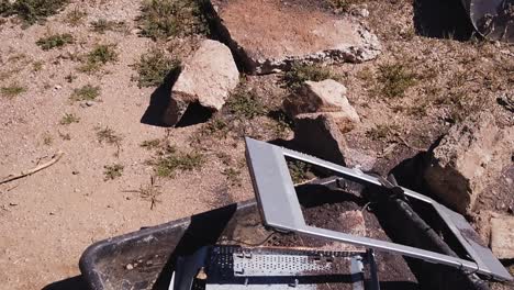 tilt-up-on-an-extended-pile-of-trash-in-the-Sonoran-Desert,-Scottsdale,-Arizona