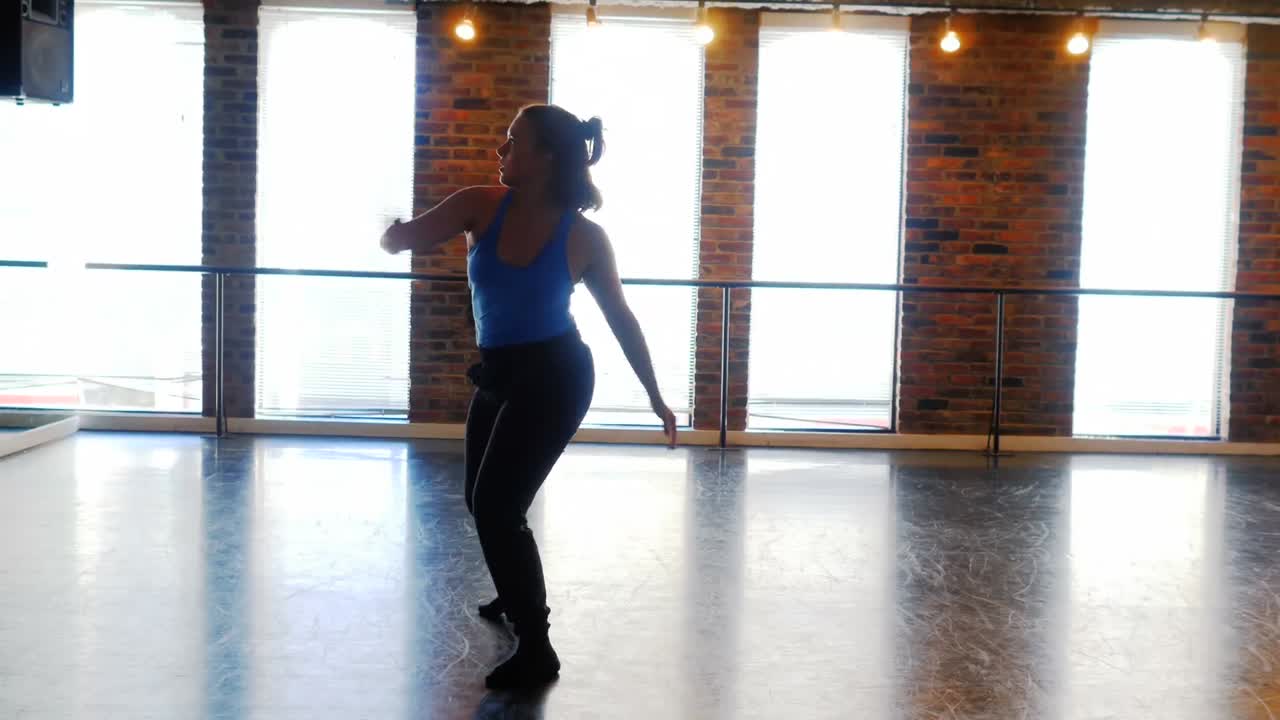 Ballerina practicing in studio