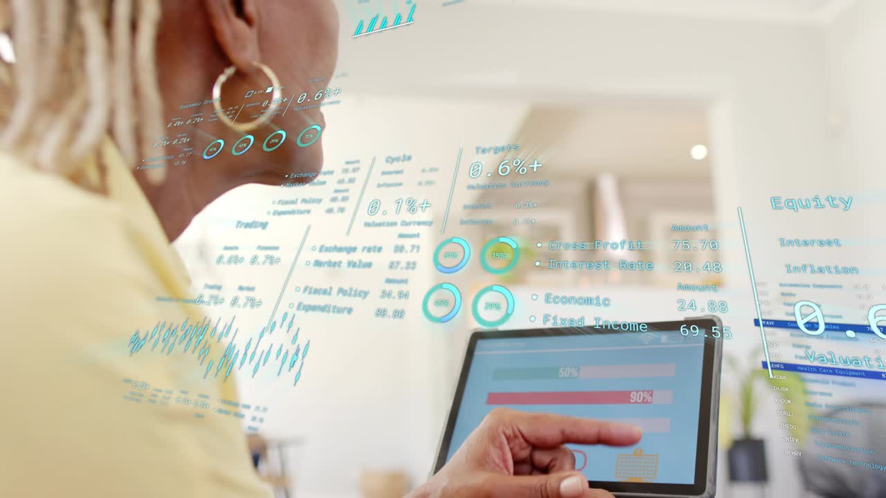 Senior woman holding tablet in home, shifting and tapping, updating finance HUD percentages