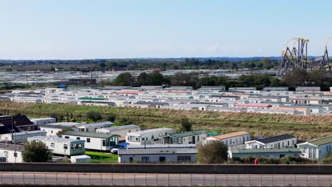 Aerial-drone-footage-of-the-famous-Butllins-holiday-camp-based-in-the-seaside-town-of-Skegness-Lancashire,-UK