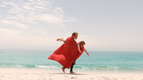 father and son dressed as superman