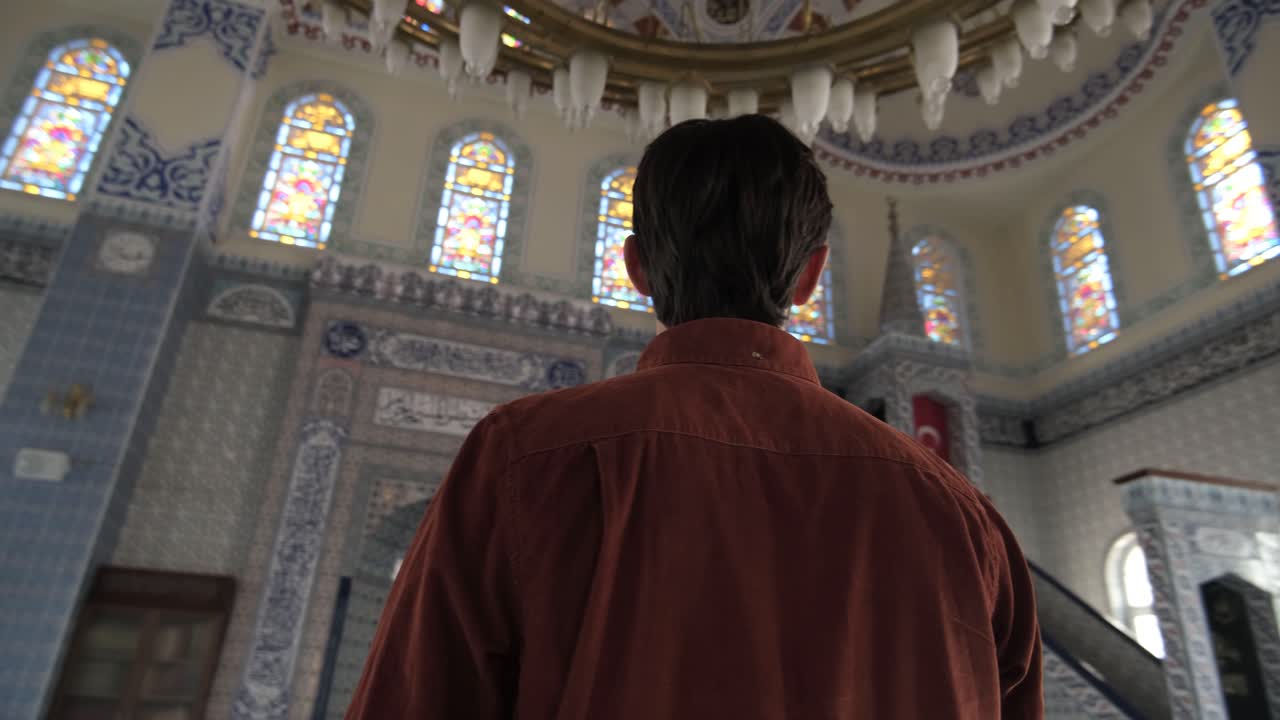 Young Guy Looking In Mosque