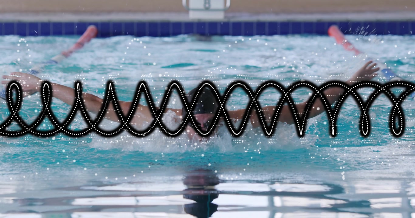 Male swimmer entering frame performing butterfly cycle against lane marker 8 for sports training