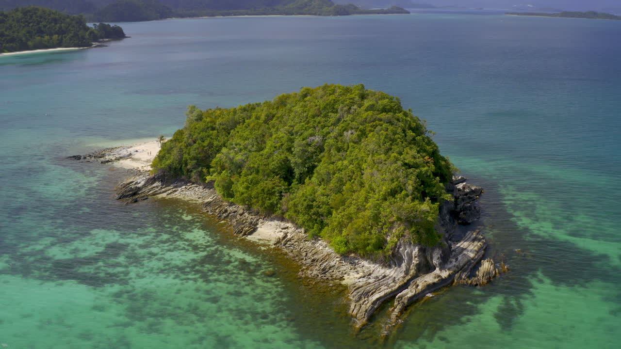 Stunning Aerial View of a Tropical Island with Clear Turquoise Waters