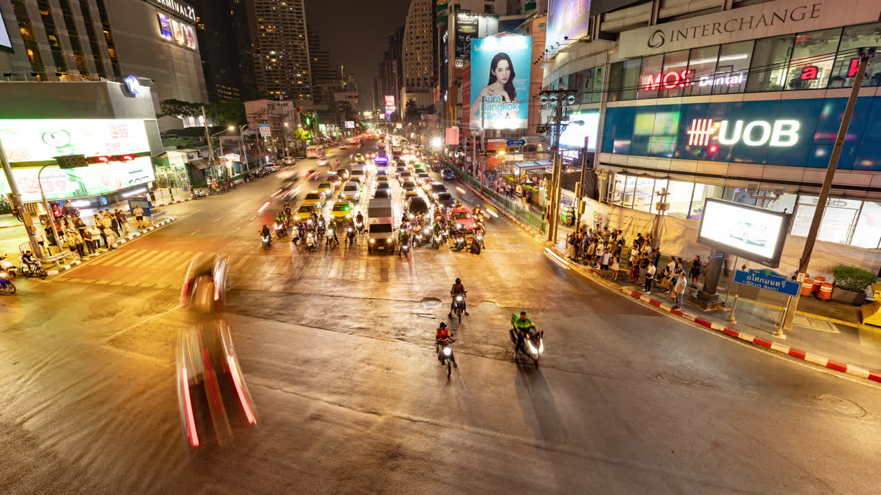 timelapse of rush hour traffic in central bangkok at night