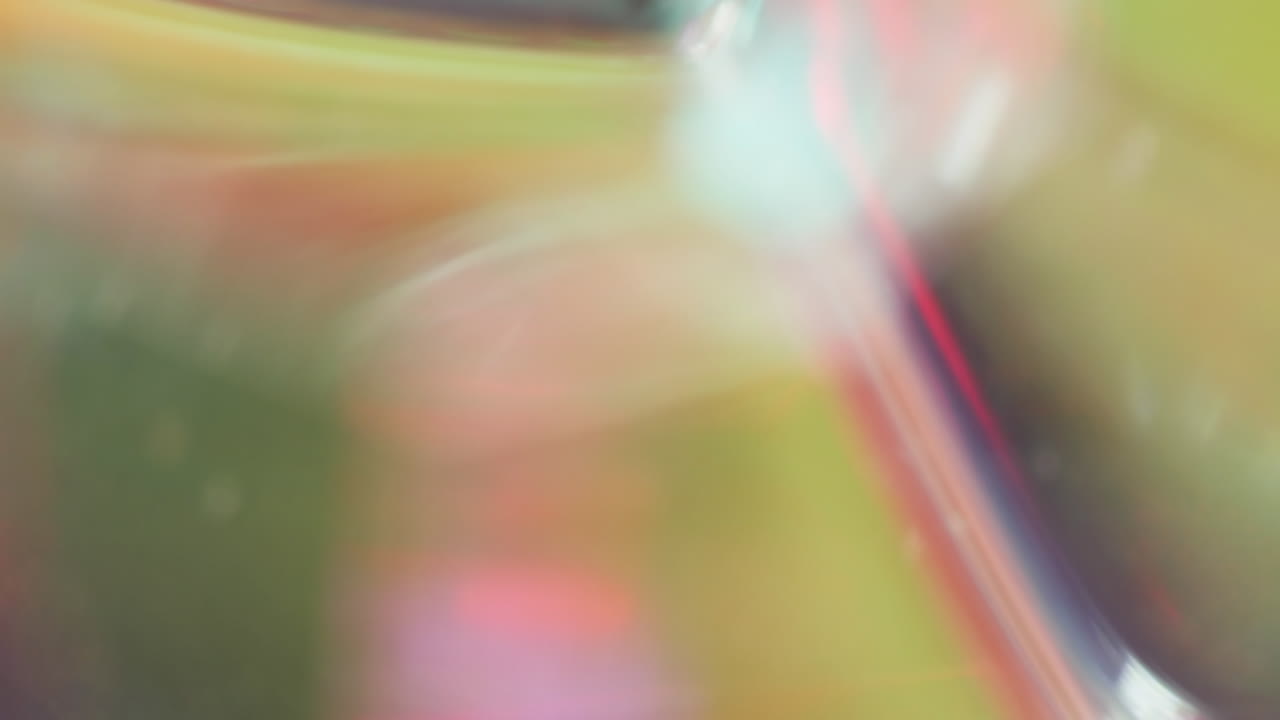 Animation of sale text over close up of bauble and abstract pattern