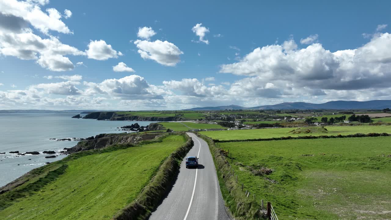 Ireland Coast Waterford car driving on the Copper Coast road at Tankardstown