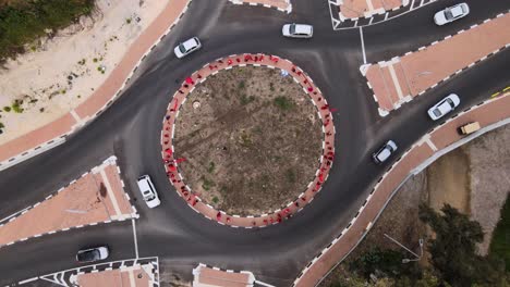 Aerial-descending-shot-above-a-women's-day-demonstration-on-a-roundabout-in-Israel