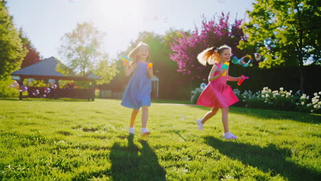 joyful children playing with bubbles outdoors