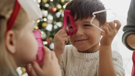 video of children having fun with  cookie cutter