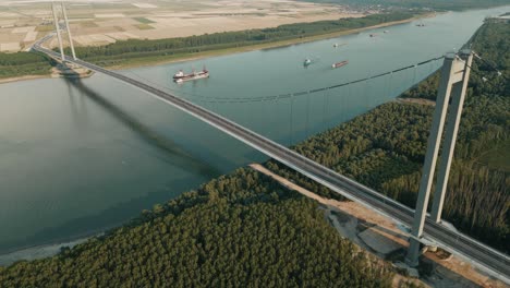 aerial view of danube river with braila bridge in galati, romania