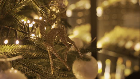 close up view of a christmas tree with christmas decorations hanging 2