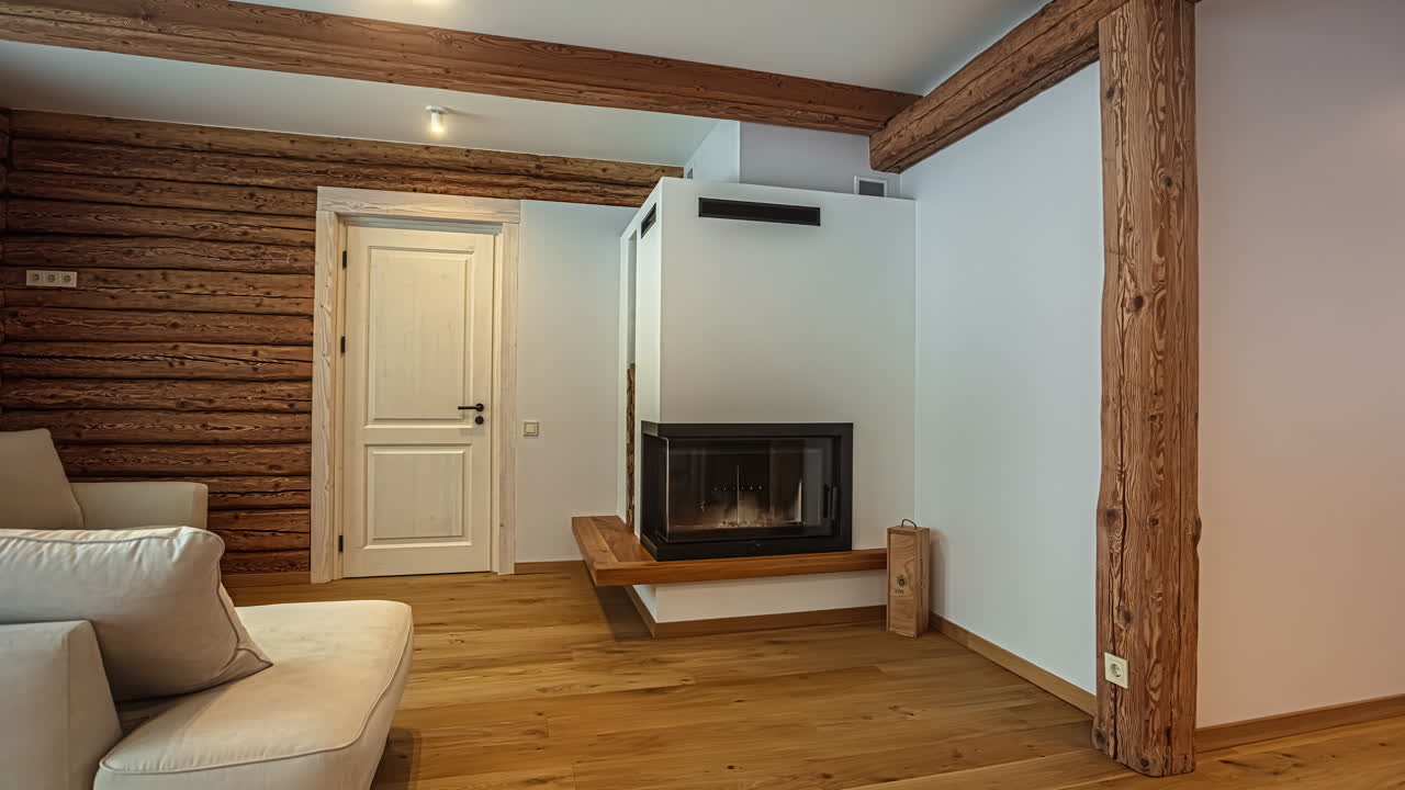 vista panorámica de una cabaña de troncos de lujo: sala de estar y chimenea acogedora