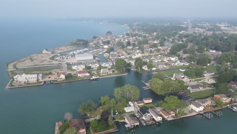 smoke of wildfires flow over new baltimore, usa, aerial drone view