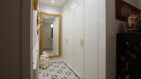 modern hallway with walk-in closet and asian decor