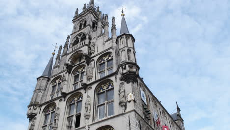 exterior view of gouda's 15th century town hall at markt square in south holland, netherlands