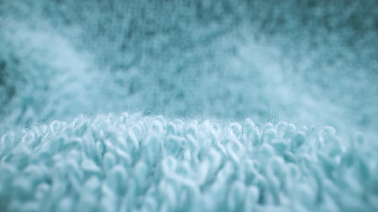 la mirada más cercana de los hilos de la tela azul