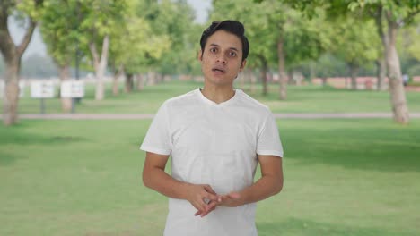 indian man talking to the camera