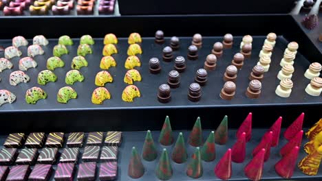 mini desserts are displayed during the gulf food exhibition in united arab emirates