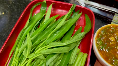 vegetables and broth in a hot pot