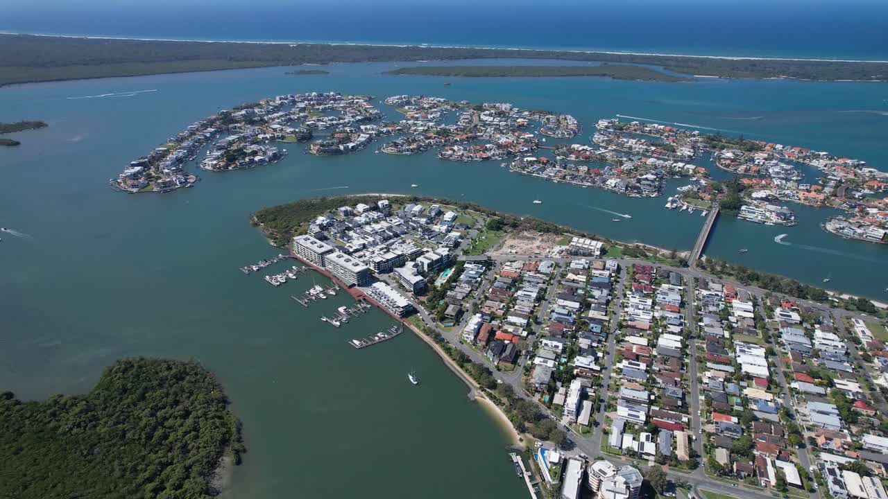 Aerial View of Coastal Residential Area with Canals and Houses