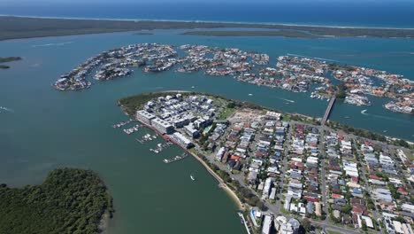 aerial view of coastal residential area with canals and houses