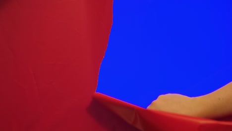 tearing decorative paper transition on blue screen with chroma key and alpha channel 4k slow motion 60fps