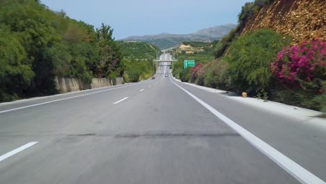 driving on road on island of crete, greece