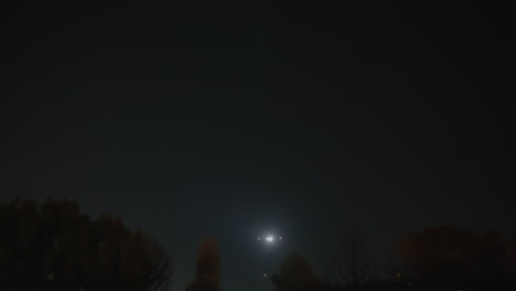 night scene with moon and helicopter