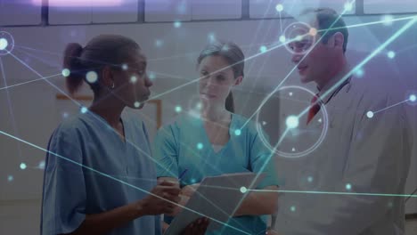 Animation-of-network-of-connections-and-light-trails-over-diverse-doctors