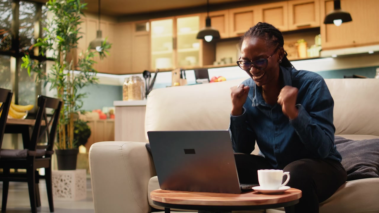 Overjoyed woman excited about career good news and remote work reward