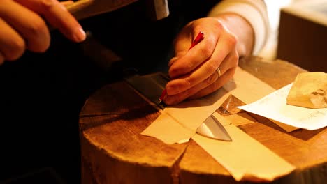 hands folding paper into an airplane over time