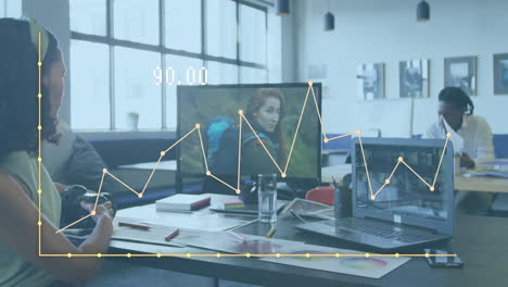 animation of data processing over diverse business people working at office