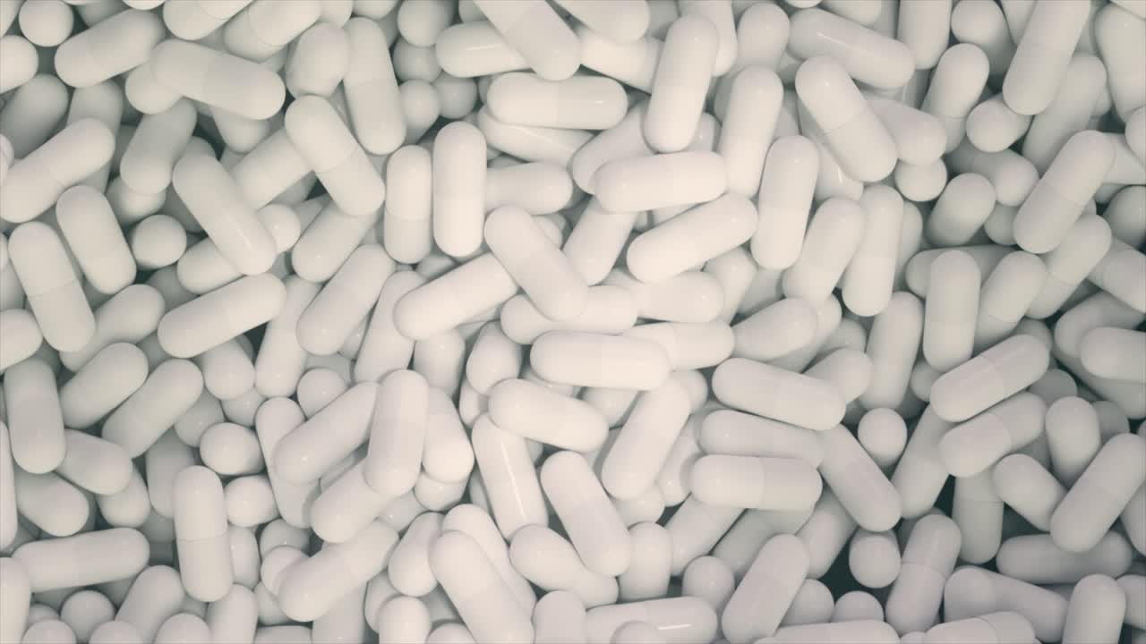 una pila de cápsulas blancas