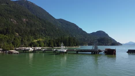 A-beautiful-aerial-view-of-vintage-abandoned-port-in-Porteaux-Cove-Provincial-Park,-BC,-Canada