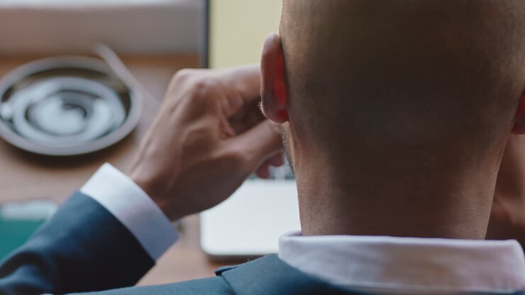 businessman using digital laptop computer in cafe drinking coffee working browsing emails networking online enjoying internet connection