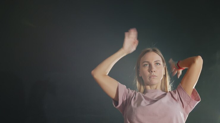 Young Woman Dancing in the Studio