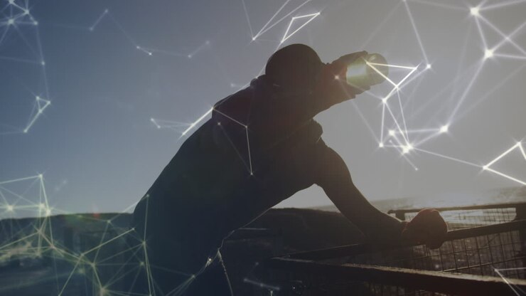 Animation of network of connections over an exercising african american man