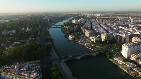 aerial panoramic view of seville city and river guadalquivir during dawn in andalusia, spain