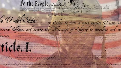 digital composite video of us constitution text against waving us flag and american soldier